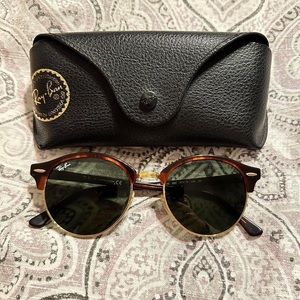 Ray bans! Green lenses, brown features.